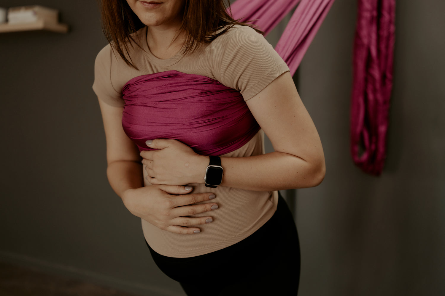 Pregnant lady using the birth sling