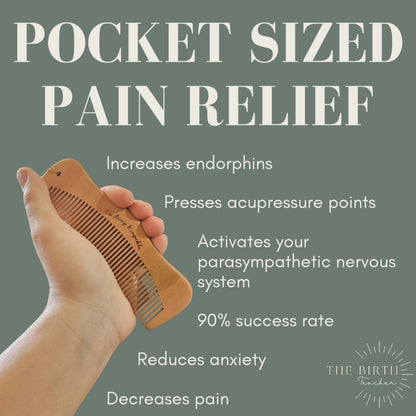 Wooden birth comb held in a hand with text about pocket-sized pain relief on a gray background